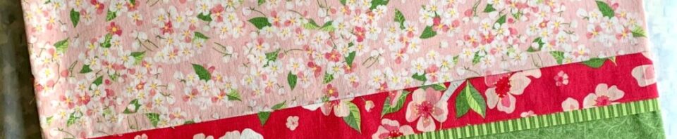 Colorful floral fabric patchwork design.