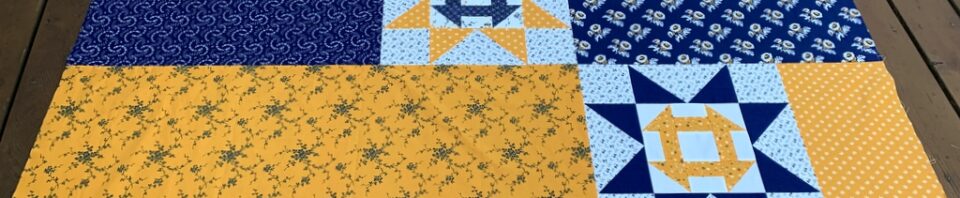 Colorful quilt blocks in yellow and blue.