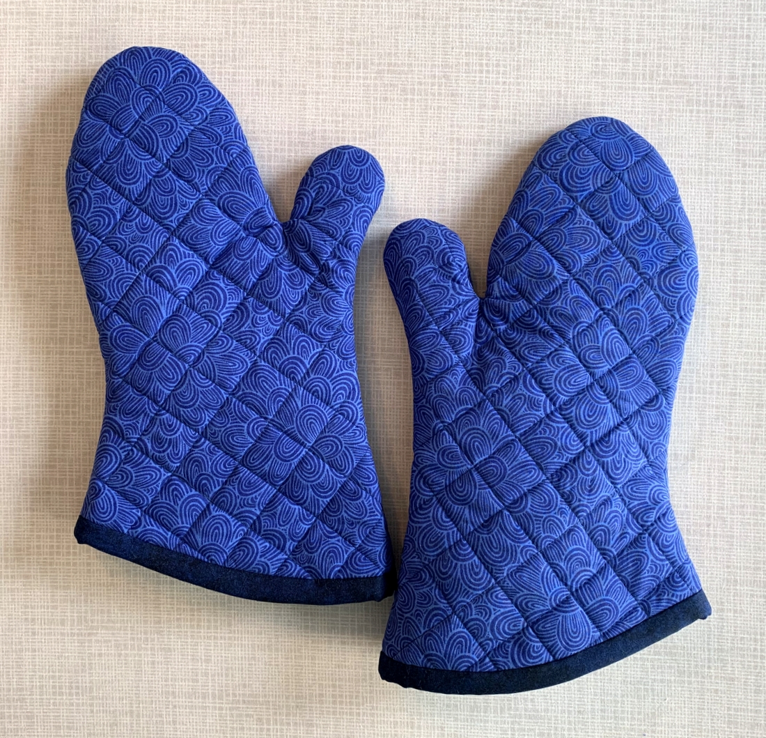 https://firstlightdesigns.com/wp-content/uploads/2022/03/oven-mitts-for-tracy.jpg