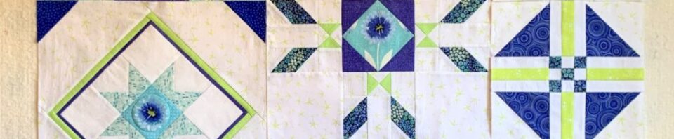 Colorful quilt blocks in geometric patterns.