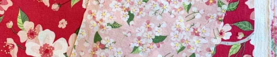 Floral fabric patterns in pink and red.