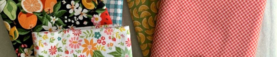 Colorful fabric squares in various patterns.